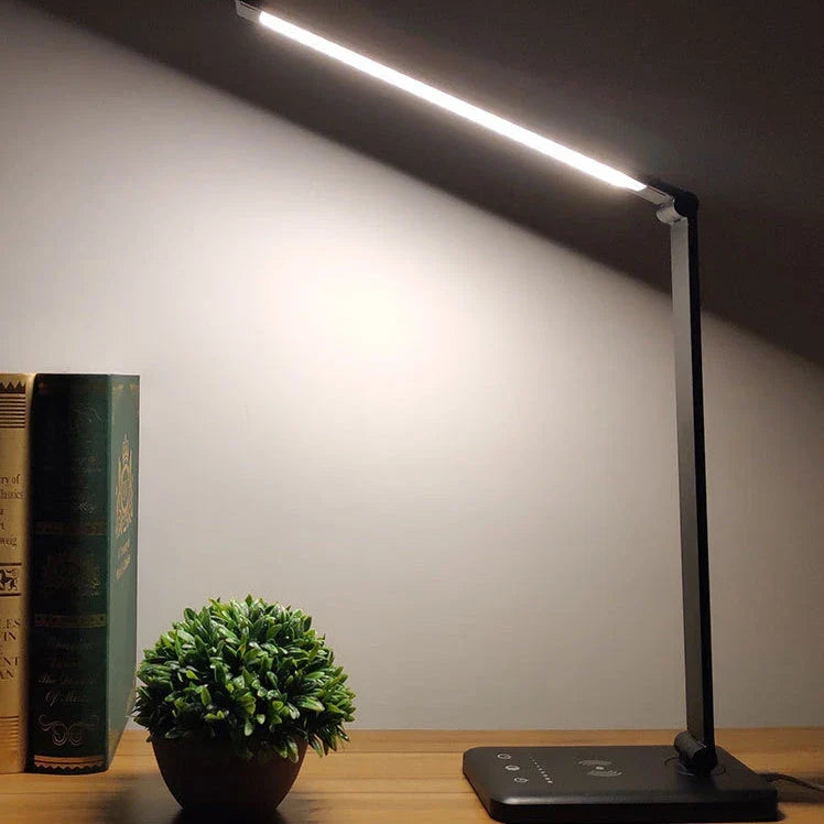 Premium wireless charging LED desk lamp with adjustable lighting, auto-timer, and foldable design for a customisable workspace