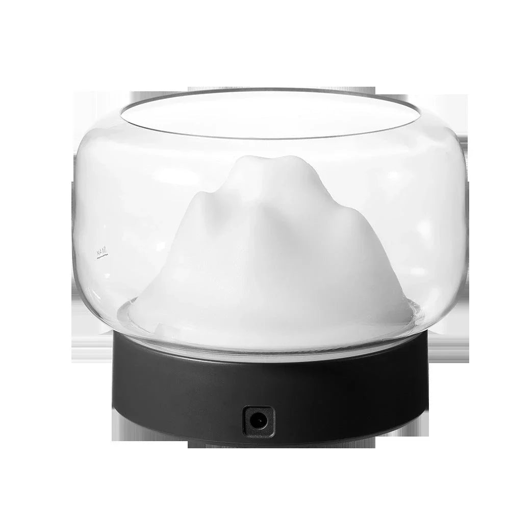Premium aroma diffuser with serene mountain landscape design and multi-coloured night light for relaxation and well-being