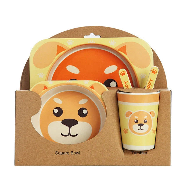Five-piece bamboo fibre children's tableware set with plates, bowls, cups, spoons, and forks in various animal-themed designs