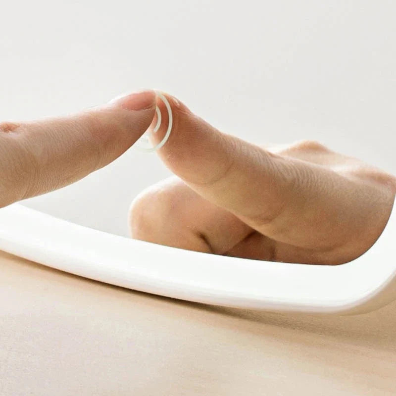 Adjustable LED makeup mirror with three-colour lighting, high-definition glass, and foldable design for versatile grooming on the go