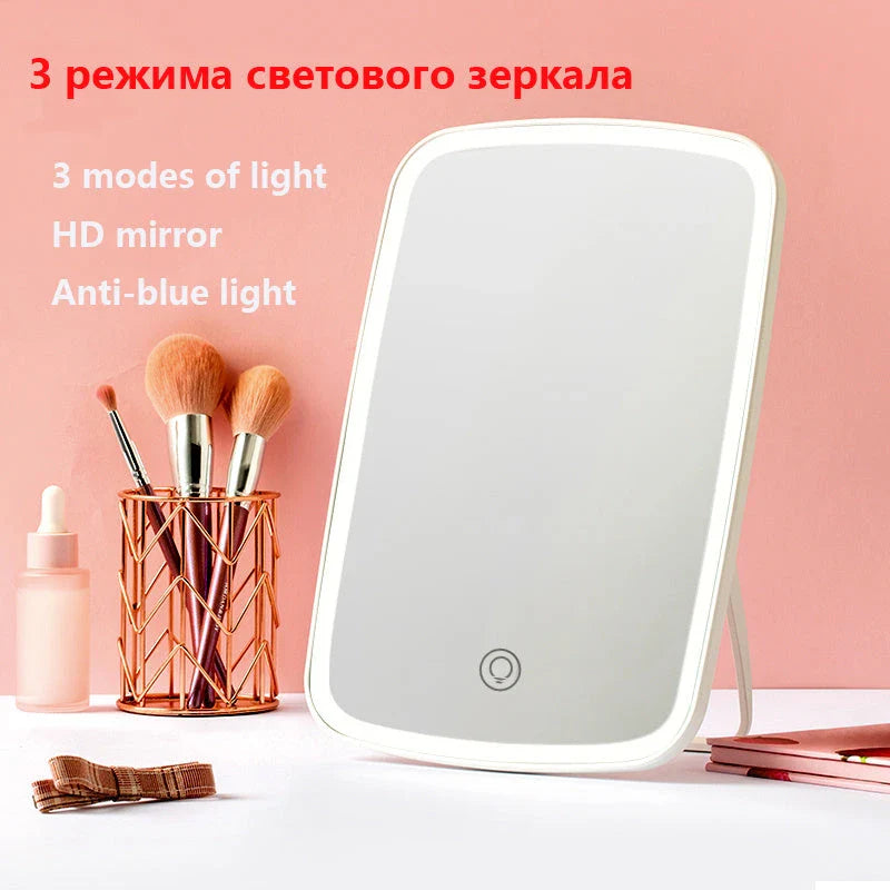Adjustable LED makeup mirror with three-colour lighting, high-definition glass, and foldable design for versatile grooming on the go