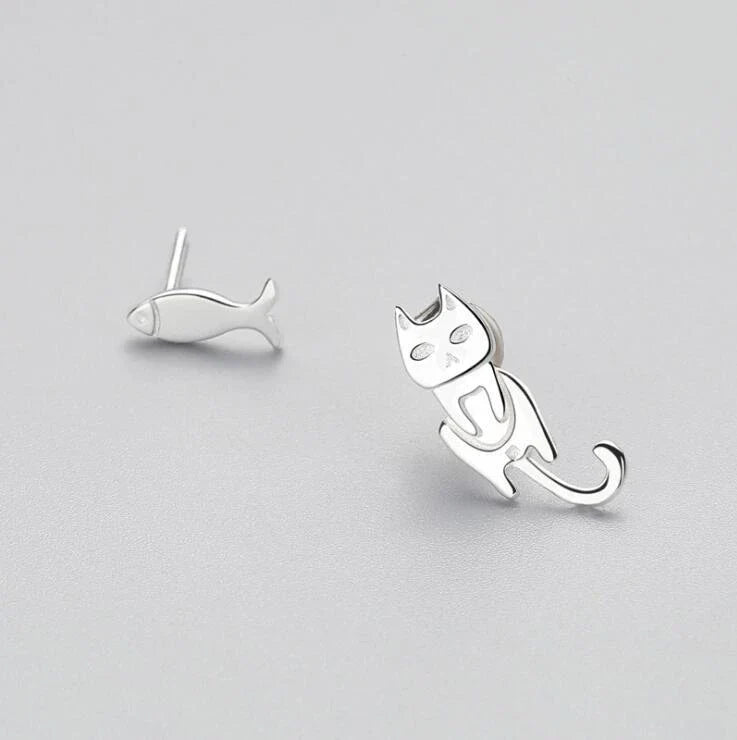 Elegant asymmetric 925 sterling silver stud earrings with cat and fish motifs, a modern and sophisticated accessory