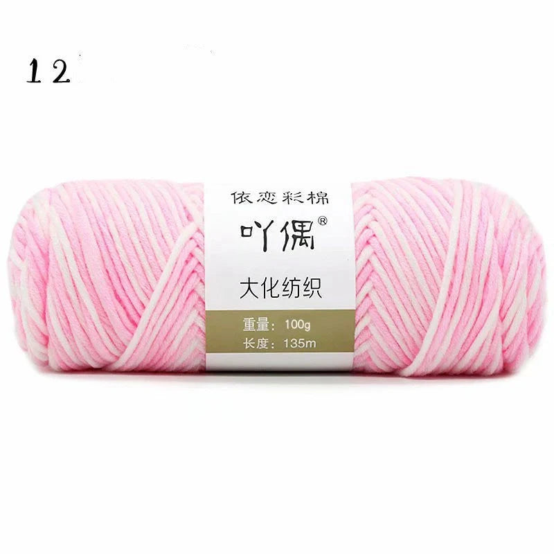 Luxurious gradient milk cotton yarn balls in a variety of vibrant colours, perfect for knitting, weaving, and other textile crafts.