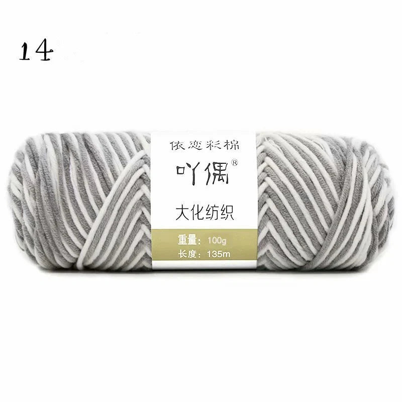 Luxurious gradient milk cotton yarn balls in a variety of vibrant colours, perfect for knitting, weaving, and other textile crafts.