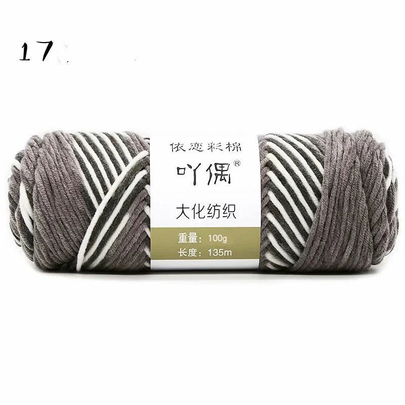 Luxurious gradient milk cotton yarn balls in a variety of vibrant colours, perfect for knitting, weaving, and other textile crafts.