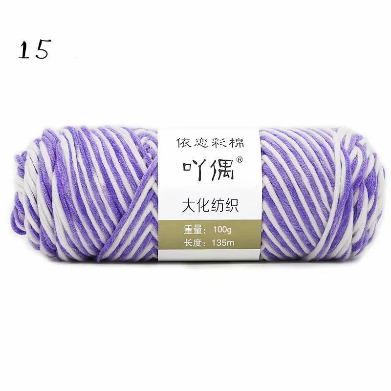 Luxurious gradient milk cotton yarn balls in a variety of vibrant colours, perfect for knitting, weaving, and other textile crafts.