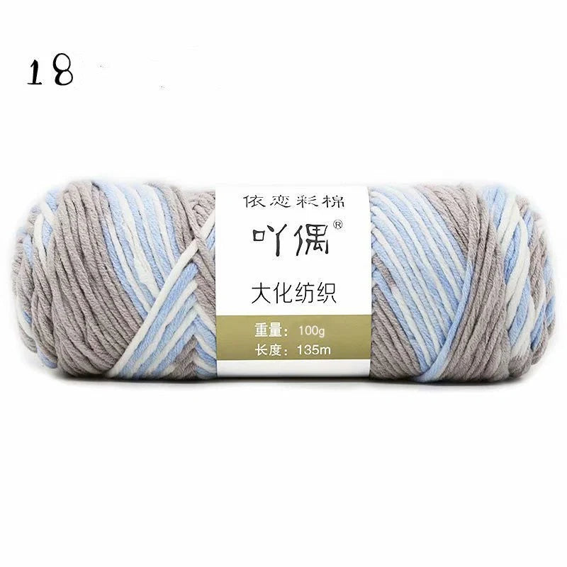 Luxurious gradient milk cotton yarn balls in a variety of vibrant colours, perfect for knitting, weaving, and other textile crafts.