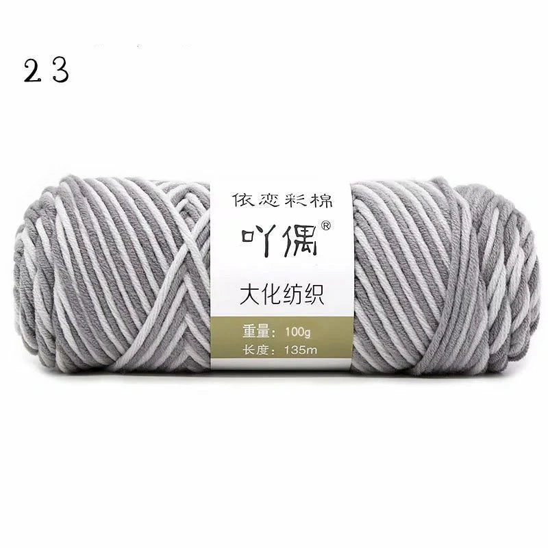Luxurious gradient milk cotton yarn balls in a variety of vibrant colours, perfect for knitting, weaving, and other textile crafts.