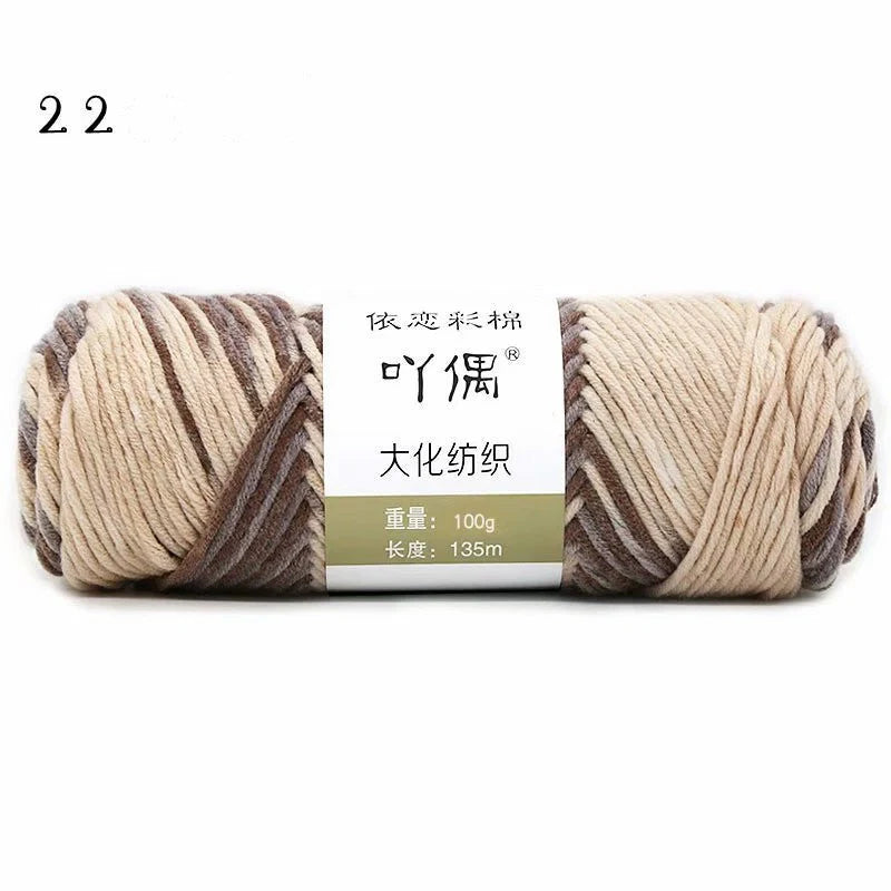 Luxurious gradient milk cotton yarn balls in a variety of vibrant colours, perfect for knitting, weaving, and other textile crafts.
