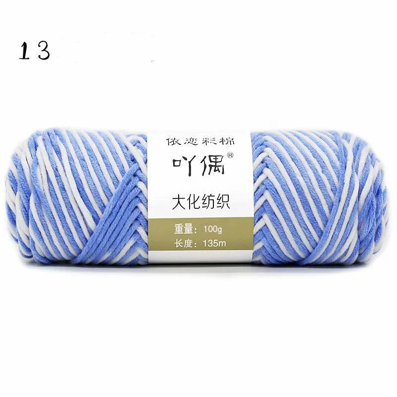 Luxurious gradient milk cotton yarn balls in a variety of vibrant colours, perfect for knitting, weaving, and other textile crafts.