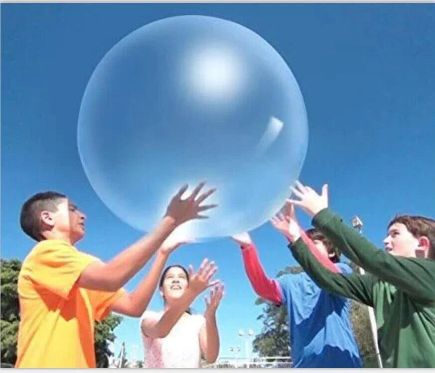 Oversized inflatable bounce balls in various vibrant colors for fun parties and celebrations