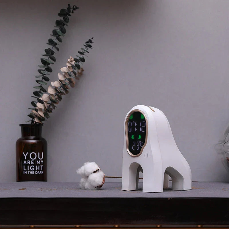 Stylish alarm clock with LED display, ambient lighting, and snooze function for a relaxing sleep environment