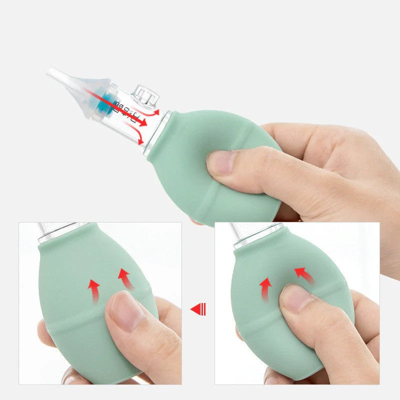 Infant silicone nasal aspirator pump in pink and green, designed for gentle cold relief