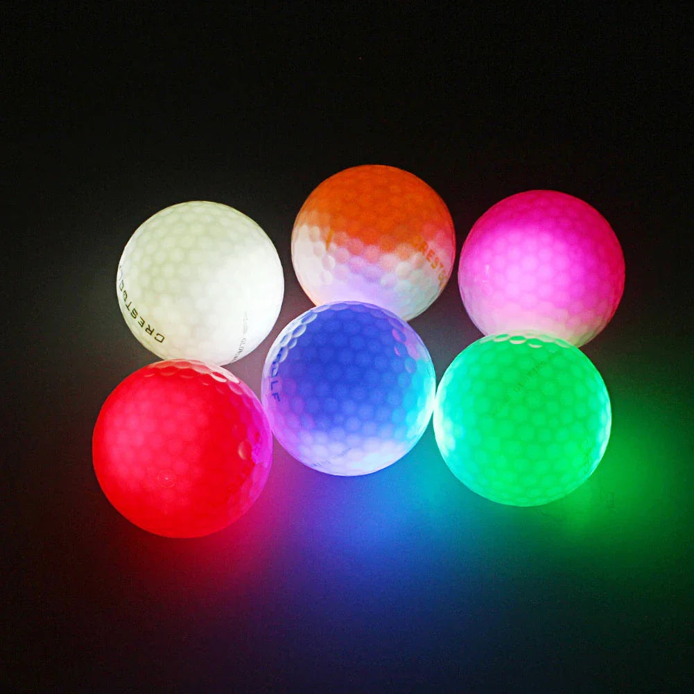 Luminous golf balls emitting a trail of light as they soar through the night sky, offering a captivating golfing experience.