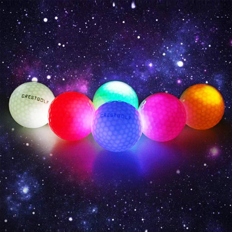 Luminous golf balls emitting a trail of light as they soar through the night sky, offering a captivating golfing experience.