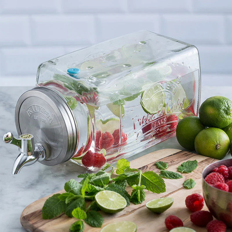 A stylish glass beverage dispenser with a sleek faucet, perfect for serving chilled drinks at home or events.