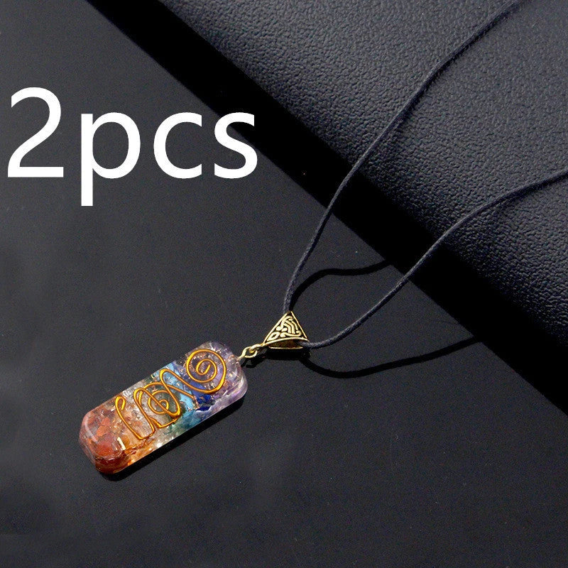 A stunning chakra crystal pendant with natural patterns and organic imperfections, showcasing the beauty of nature.