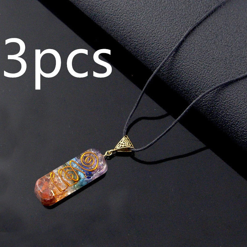 A stunning chakra crystal pendant with natural patterns and organic imperfections, showcasing the beauty of nature.