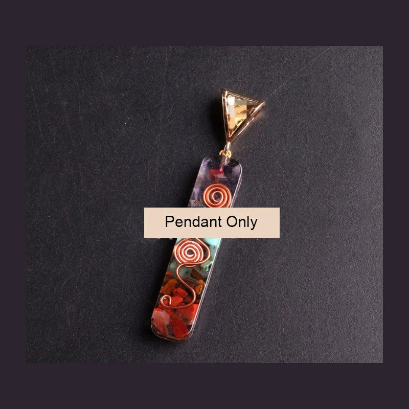 A stunning chakra crystal pendant with natural patterns and organic imperfections, showcasing the beauty of nature.