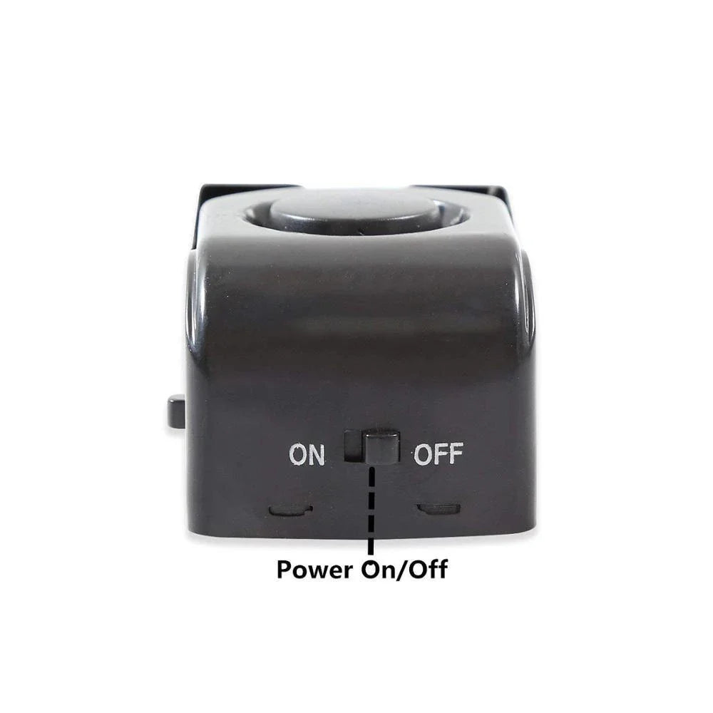 Wedge-shaped home security alarm with ABS construction and loud siren to deter intruders