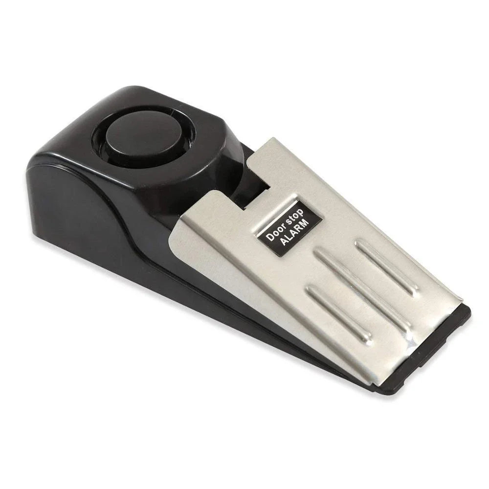 Wedge-shaped home security alarm with ABS construction and loud siren to deter intruders