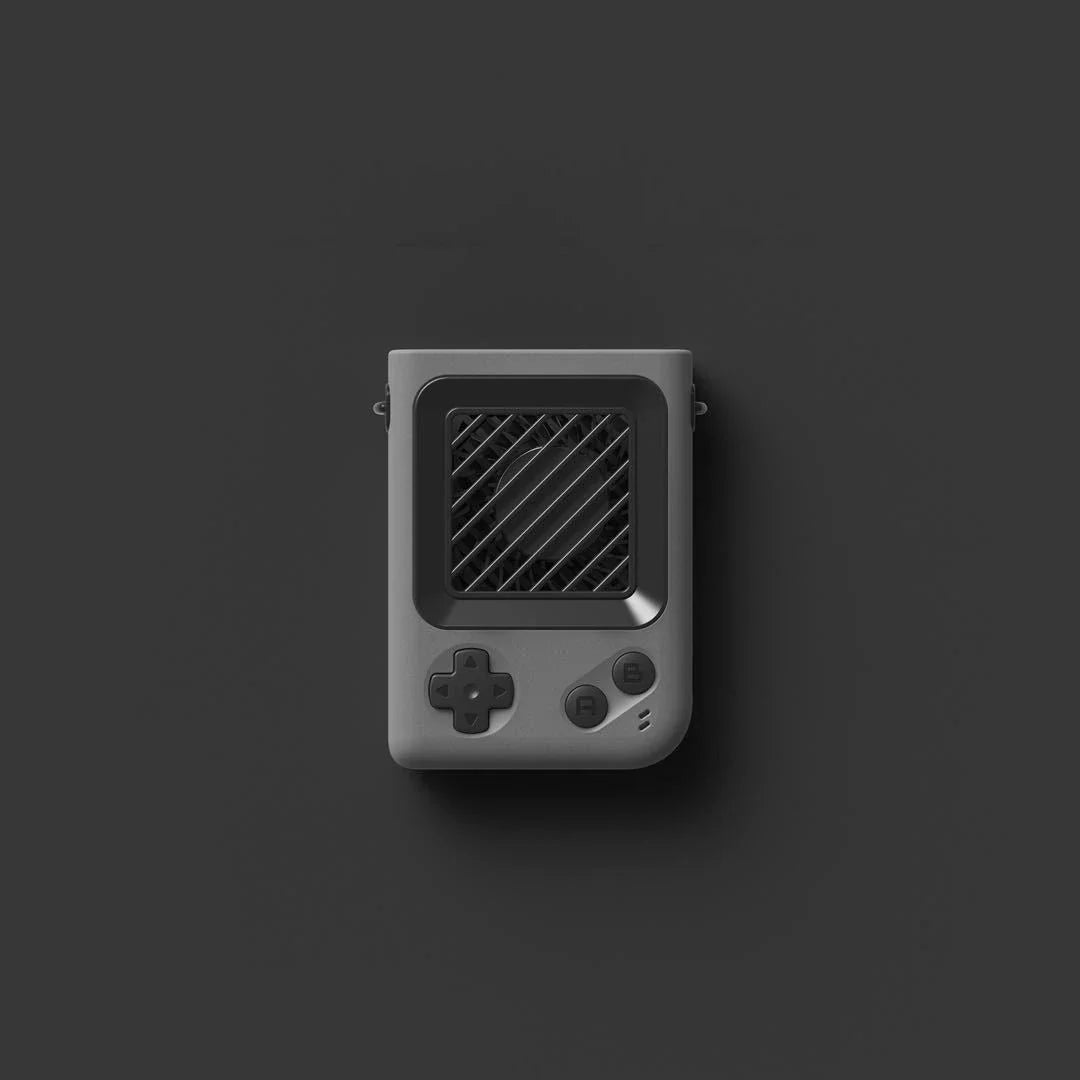 Compact portable game console fan in various colors, providing cooling for gamers on the go