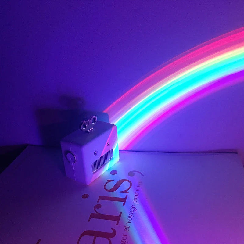 Enchanting rainbow projection lamp with vibrant multi-coloured LED lighting, creating a calming, relaxing atmosphere in the bedroom