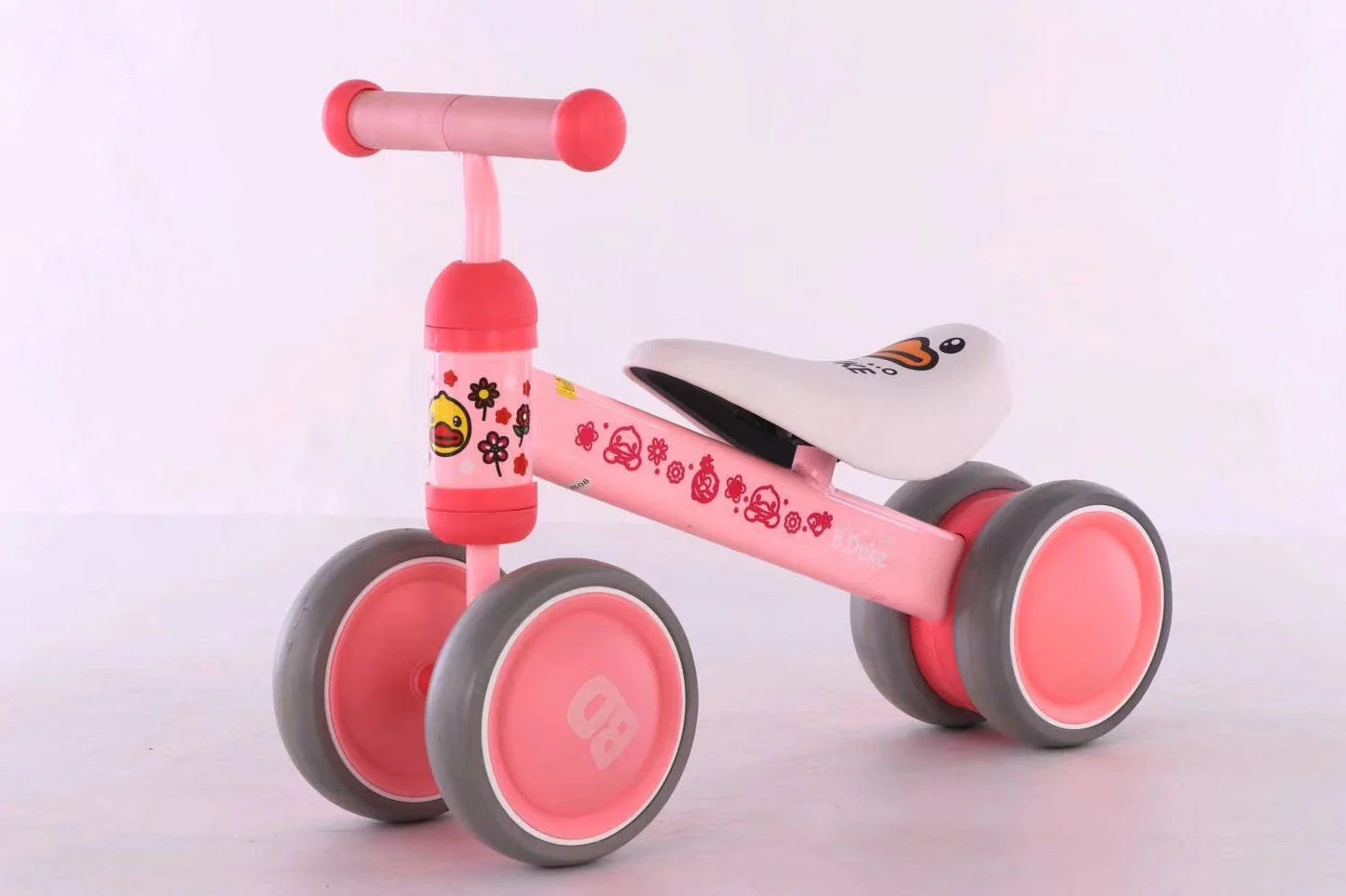 Sturdy three-wheeled balance bike for British toddlers with durable steel frame, comfortable PU leather seat, and smooth-rolling EVA foam tyres