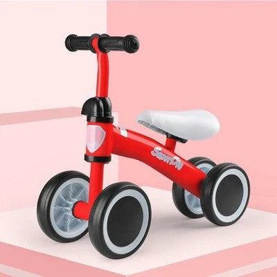 Sturdy three-wheeled balance bike for British toddlers with durable steel frame, comfortable PU leather seat, and smooth-rolling EVA foam tyres