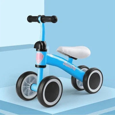 Sturdy three-wheeled balance bike for British toddlers with durable steel frame, comfortable PU leather seat, and smooth-rolling EVA foam tyres