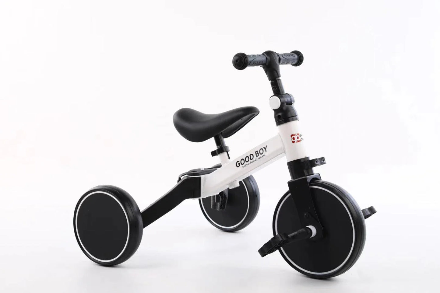 Sturdy three-wheeled balance bike for British toddlers with durable steel frame, comfortable PU leather seat, and smooth-rolling EVA foam tyres