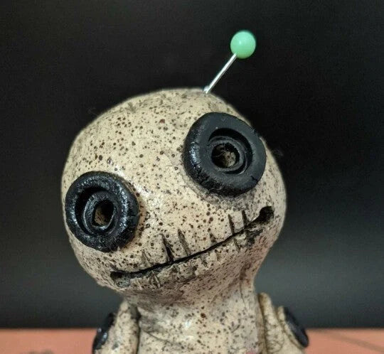 Handcrafted voodoo doll cone incense burner with smoke effect