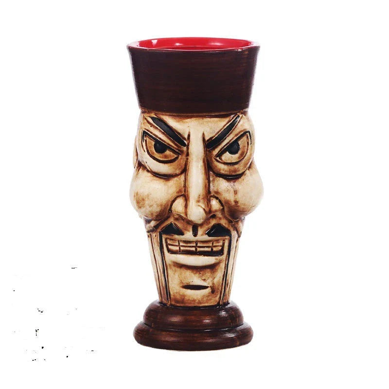 A ceramic tiki mug with a 3D decorative face, perfect for tropical cocktails, smoothies, and other chilled beverages.