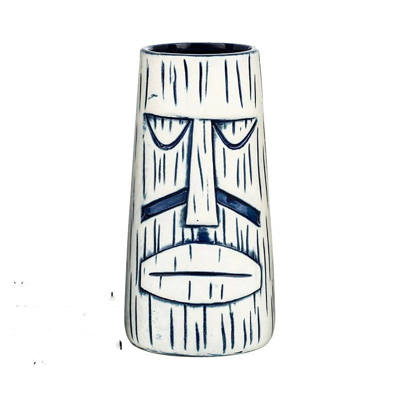 A ceramic tiki mug with a 3D decorative face, perfect for tropical cocktails, smoothies, and other chilled beverages.
