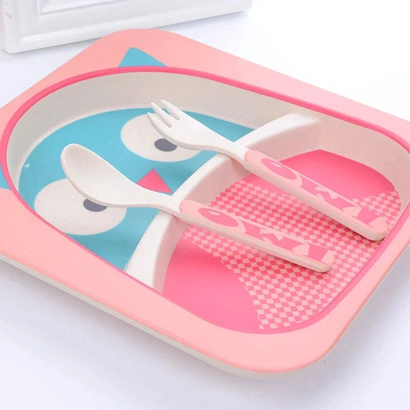 Five-piece bamboo fibre children's tableware set with plates, bowls, cups, spoons, and forks in various animal-themed designs