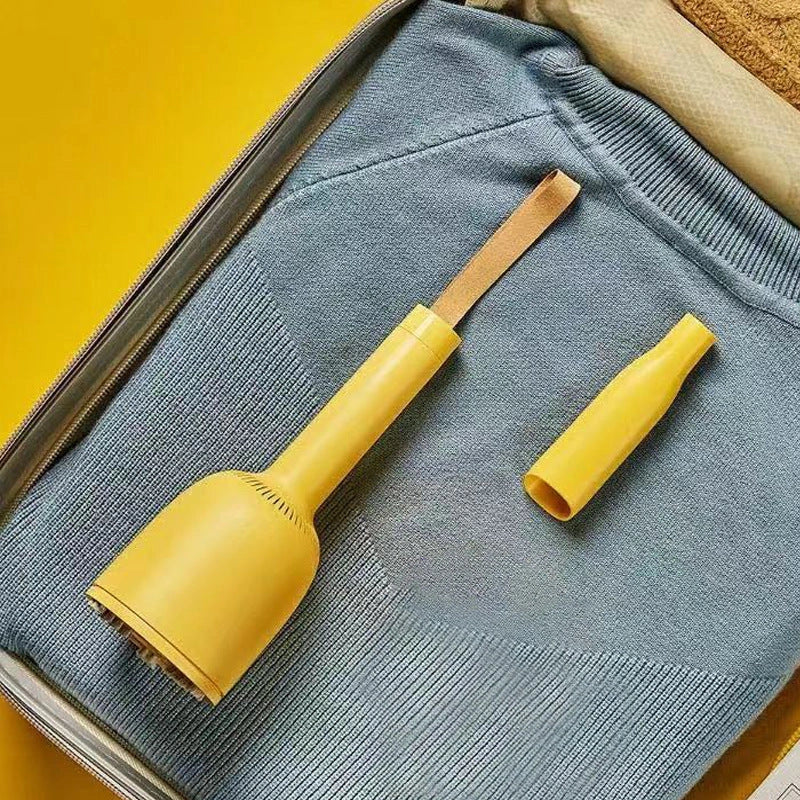 Portable rechargeable vacuum cleaner with hairball trimmer and USB charging