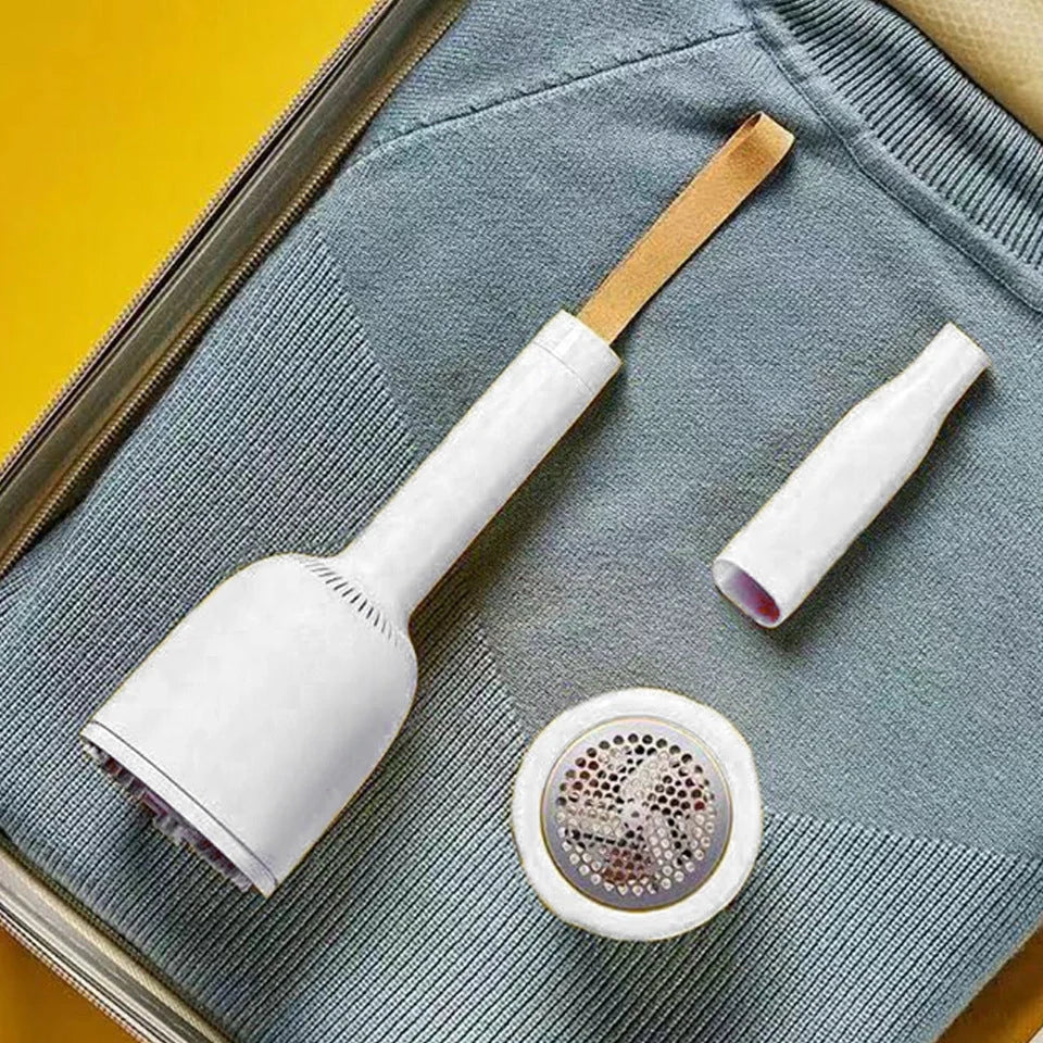 Portable rechargeable vacuum cleaner with hairball trimmer and USB charging