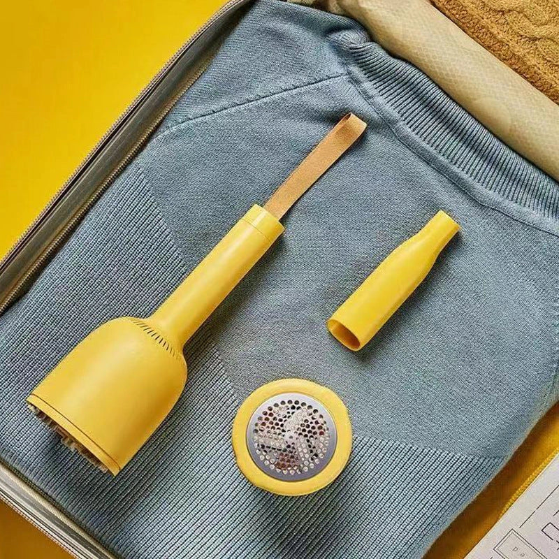 Portable rechargeable vacuum cleaner with hairball trimmer and USB charging