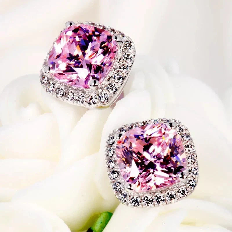 Elegant copper earrings adorned with sparkling zircon gems in a timeless European-inspired geometric design