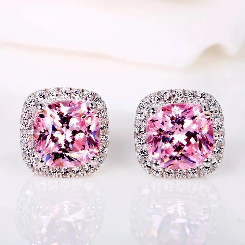 Elegant copper earrings adorned with sparkling zircon gems in a timeless European-inspired geometric design