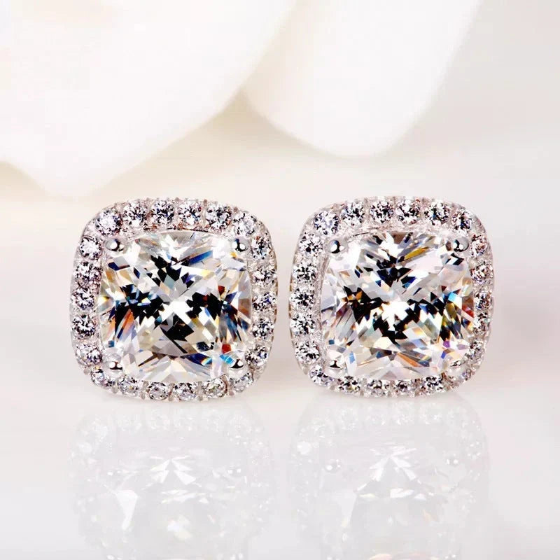 Elegant copper earrings adorned with sparkling zircon gems in a timeless European-inspired geometric design
