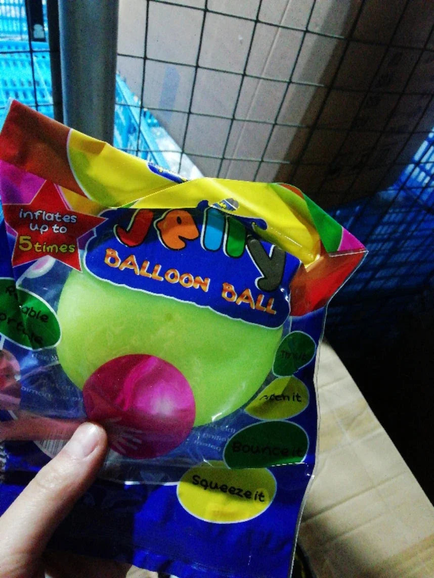 Oversized inflatable bounce balls in various vibrant colors for fun parties and celebrations