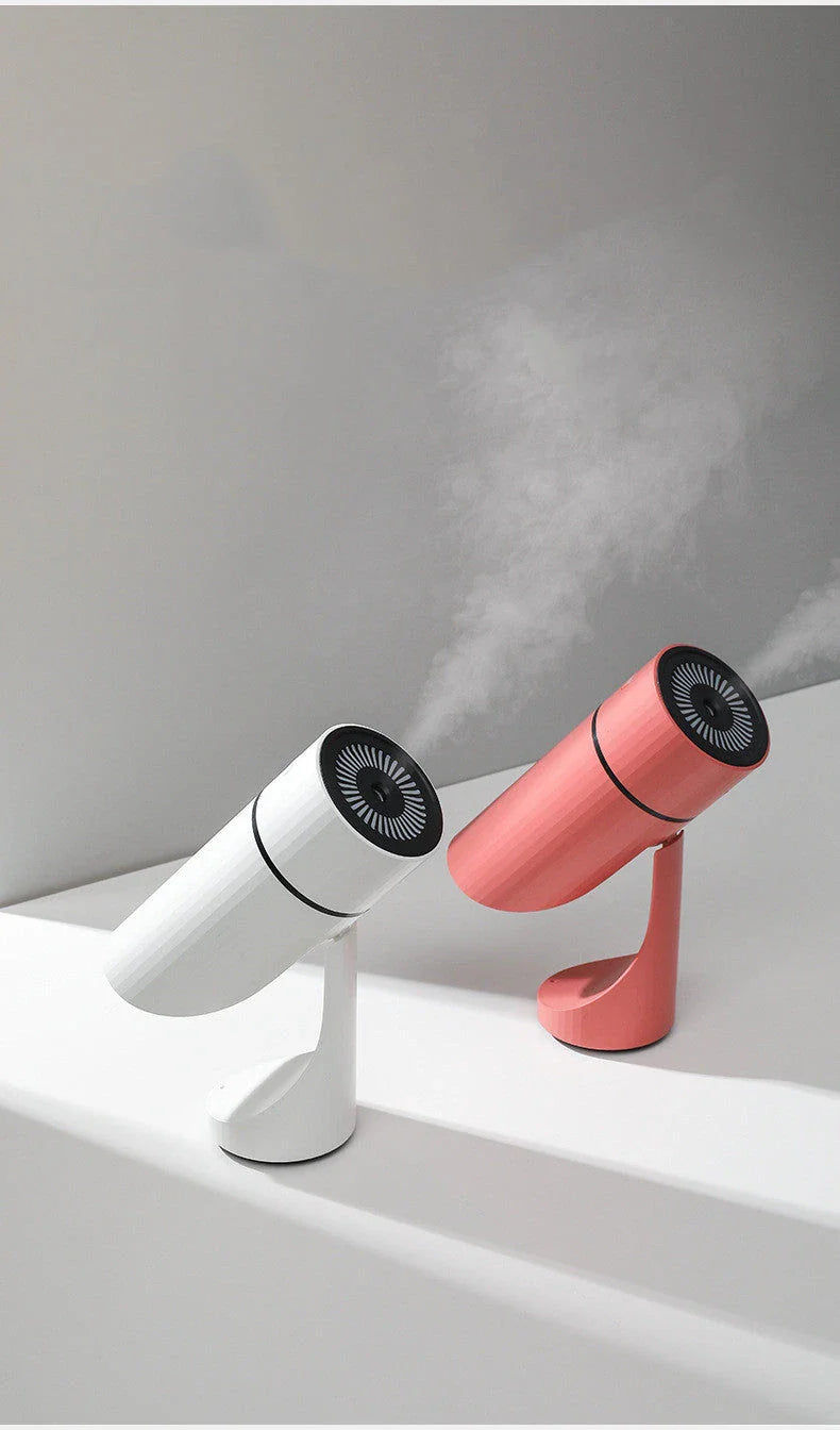 Compact USB-powered humidifier with adjustable mist, night light, and dual spray modes for desks and cars