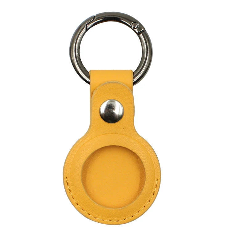 Premium leather AirTag keychain case in various colors, providing durable protection and stylish carry for your Apple tracking device
