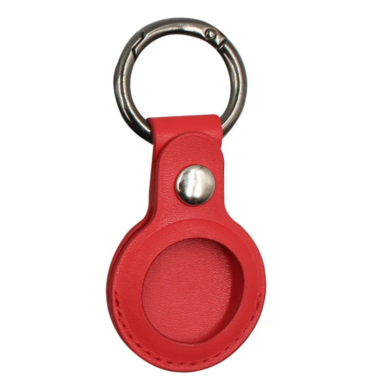 Premium leather AirTag keychain case in various colors, providing durable protection and stylish carry for your Apple tracking device