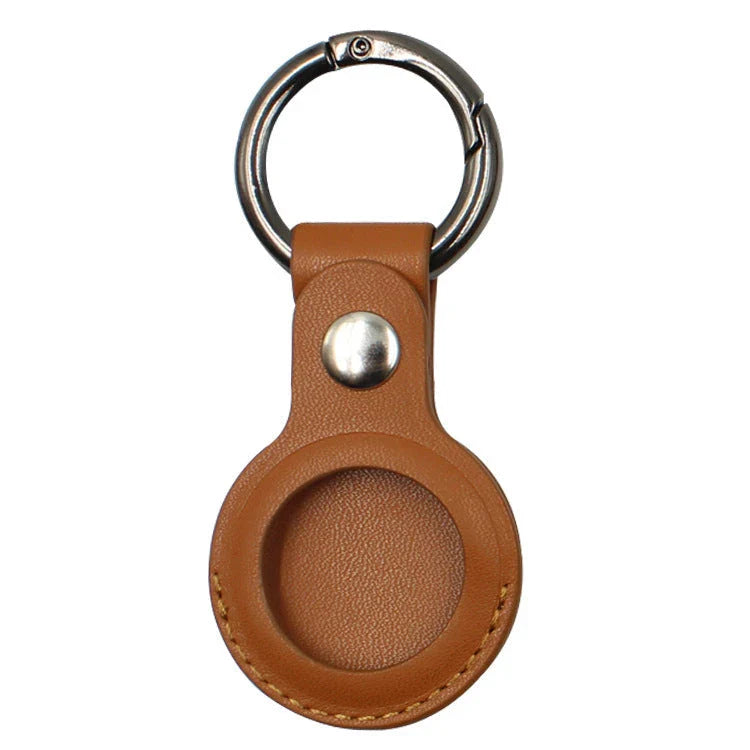 Premium leather AirTag keychain case in various colors, providing durable protection and stylish carry for your Apple tracking device