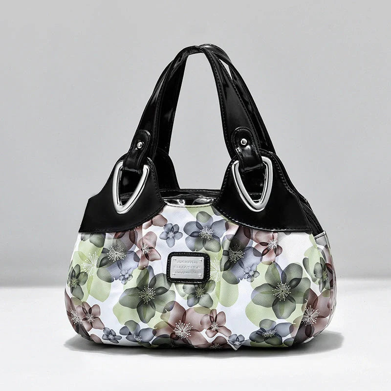 Women's multicolour PU leather dumpling handbag with floral design and multiple pockets