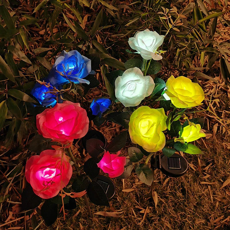Solar-powered rose flower lights in red, pink, blue, white, and yellow colors for outdoor garden decor