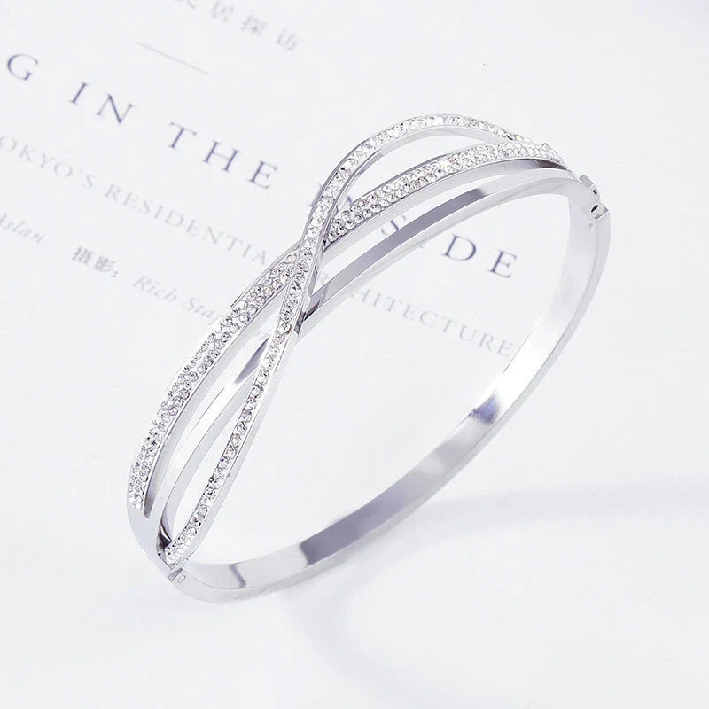 Titanium steel bracelet with geometric diamond detailing, available in rose gold, golden, and silver finishes