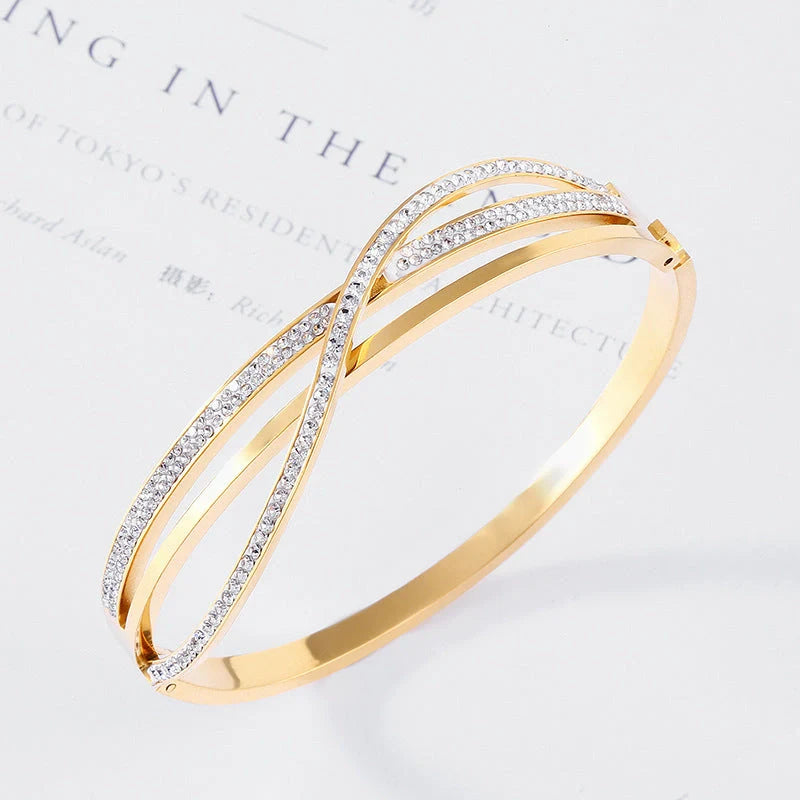 Titanium steel bracelet with geometric diamond detailing, available in rose gold, golden, and silver finishes